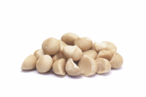 small pile of macadamia nuts on a white background